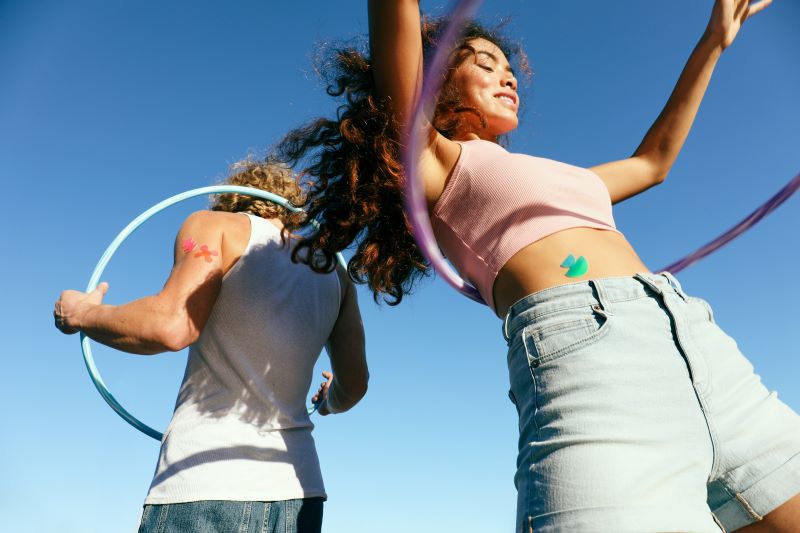 couple wearing wearables patches
